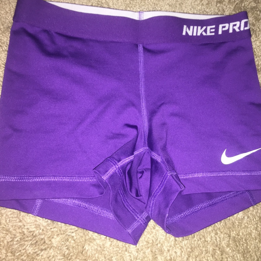 Purple + white Nike Pros, size XS